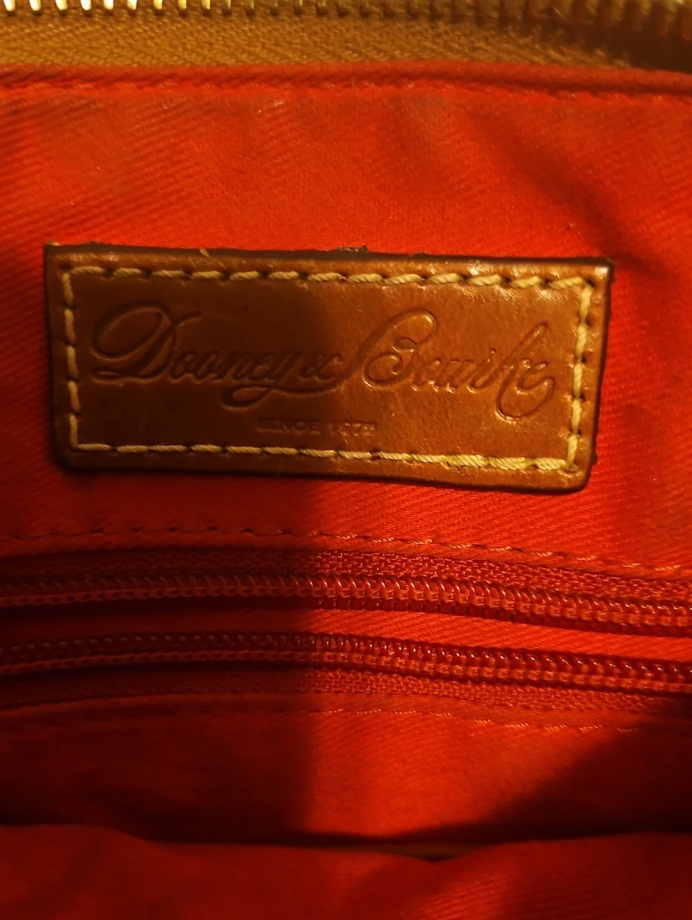 Dooney & Bourke Black Pebbled Leather Satchel with Brown Trim